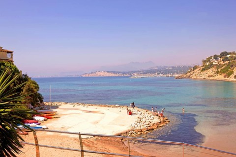 Lonely, shell-shaped beach, Moraira, former fishing village, pearl of the Costa Blanca,