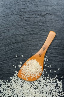 Rice grains with cooking spoon, rice