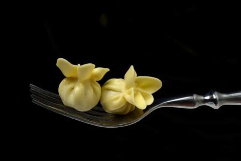Saccottini, type of Italian pasta on fork, pasta from Italy