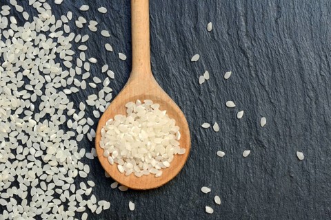 Rice grains in cooking spoons, rice