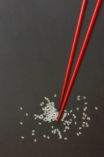 Rice and chopsticks. Oryza