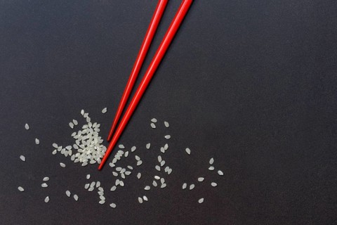 Rice and chopsticks. Oryza