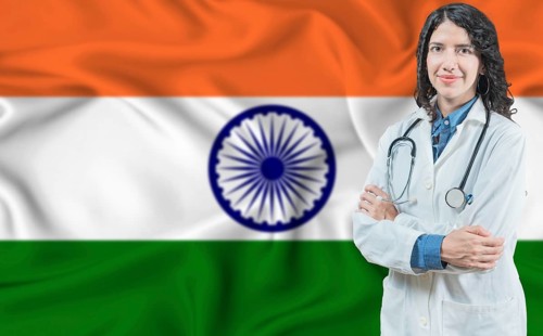 Indian medicine and healthcare concept. Doctor close up against India flag background
