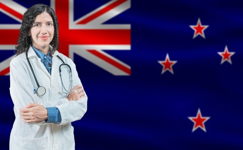 New Zealander medicine and healthcare concept. Close up of doctor against New Zealand flag