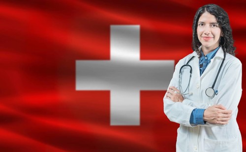 Swiss medicine and healthcare concept. Close up of doctor against Switzerland flag background