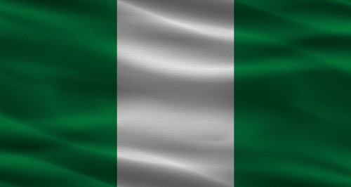 Nigeria flag with fabric texture. Realistic flag of Nigeria waving
