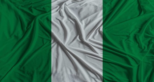 Nigerian flag with fabric texture background National flag of Nigeria with cloth texture