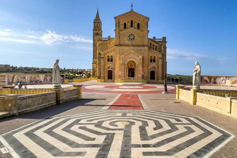 View of graphically designed forecourt of Sanctuary National Shrine Madonna Ta' Pinu Basilica in