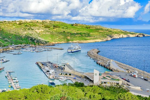 View from elevated position of ferry car ferry leaving Mgarr port of Gozo island, Gozo, Malta