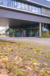 Modern building with glass façade in autumn surroundings, flat roof, Calw District Office, Calw,