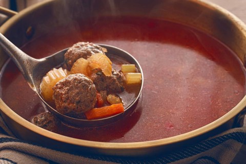 Romanian soup with meatballs, vegetable soup with meatballs, in a pot, homemade, no people