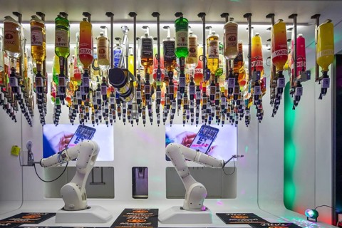 Las Vegas, Nevada - Robotic bartenders mix and serve drinks at the 'Tipsy Robot' in the Venetian