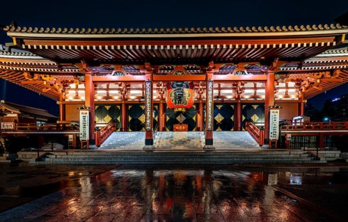 Illuminated main hall of Asakusa Shrine or Senso-ji Temple, at night, Buddhist temple complex,