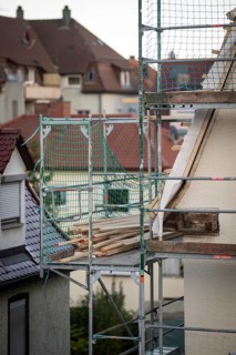 Energetic renovation of an apartment building, renovation of an old building, roof battens on