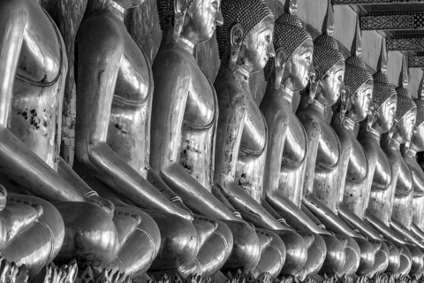 Gilded Buddha statues (Bhumispara mudra: Buddha Gautama at the moment of enlightenment), Wat Suthat