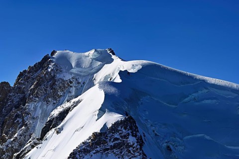 View of the snow-covered Mont Blanc du Tacul from the Aiguille du Midi, Chamonix-Mont-Blanc,