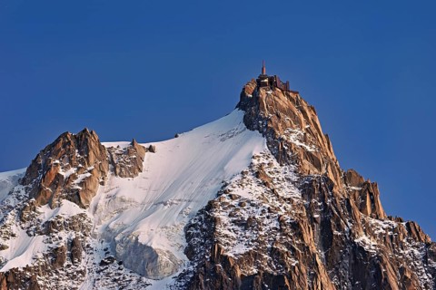 Snowy Aiguille du Midi in the evening light, Mont-Blanc, Chamonix-Mont-Blanc, Haute-Savoie, France
