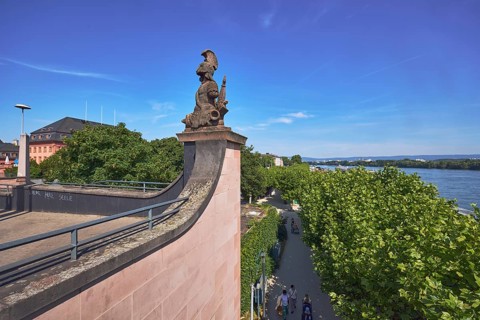 Bridgehead, Rhine river, bridge railings, trees, footpath, pedestrians as secondary motif, blue