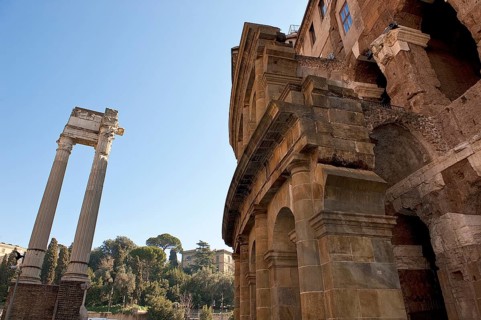 Center and right part of preserved façade of historic ancient Marcellus Theatre, left ruin of