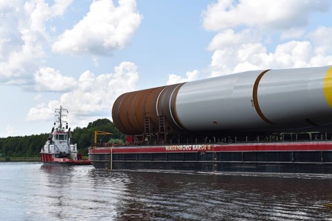 Tugboat, tow ship pulls parts of a wind turbine, offshore, in the Kiel Canal, NOK, Kiel Canal,