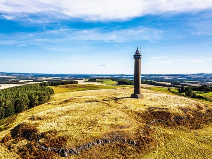 Waterloo Monument over Scottish fields and farms from a drone, Jedburgh, Scotland, UK