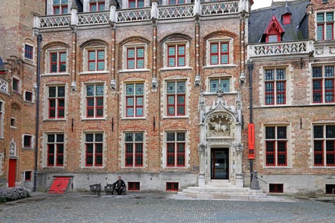 Gruuthusemuseum with equestrian statue of Lodewijk van Gruuthuse above the entrance portal in the