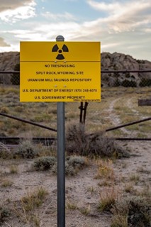 Jeffrey City, Wyoming - 'No Trespassing' signs adorn the perimeter of a former uranium mine and