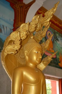 Detail of statue of Buddha in Wat Chalong pilgrimage site, Wat Chaithararam, Phuket province,