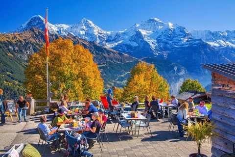 Sun terrace of the mountain inn in the hamlet of Sulwald with Eiger 3967m, Mönch 4110m and Jungfrau