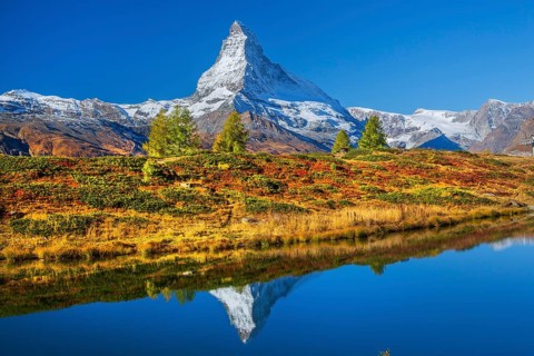 Matterhorn 4478 m with reflection in Leisee on the Sunnegga in autumn, Zermatt, Mattertal, Valais,