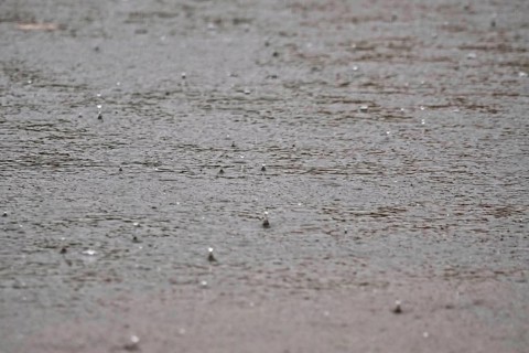 Raindrops falling on a lake, autumn, Germany