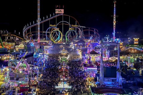 View of Oktoberfest from St. Paul's Catholic Church, Blue Hour, Munich, Bavaria, Germany
