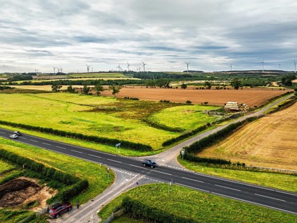 Wind Farm over fields and moors in Nord England