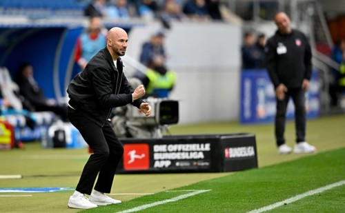 Coach coach Christian Ilzer TSG 1899 Hoffenheim on the sidelines gesture behind coach Frank Schmidt