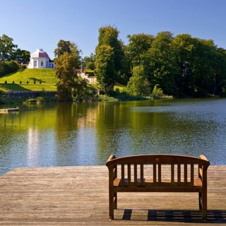 Footbridge with bench to Huwenowsee at Meseberg Castle Park, guest house and conference venue of