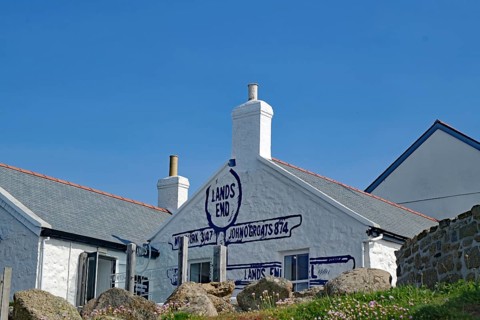 White House with painted distances and blue sky, Land's End, Cornwall, Great Britain
