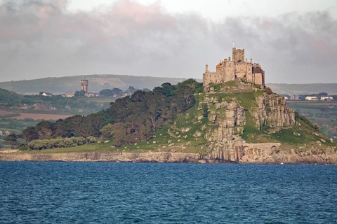 Medieval castle on a wooded seaside hill, St Michael's Mount, Cornwall, Great Britain