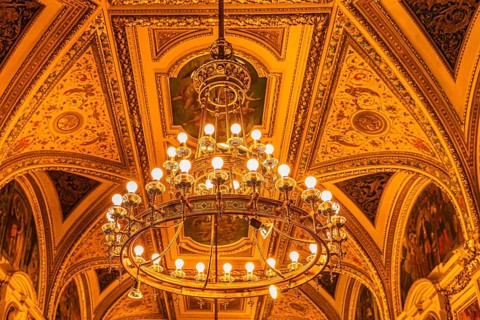Sumptuous room and chandelier in the Vienna State Opera, Vienna, Austria