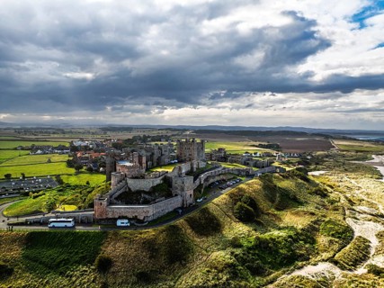 Bamburgh Castle from a drone, Northumberland, Northeast Coast, England, United Kingdom