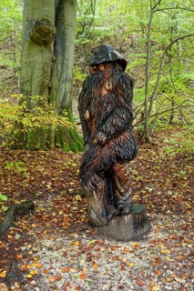 Wooden sculpture Der Pelzmichel, Pfullinger Sagenweg, stories and legends, by woodsaw artist Billy