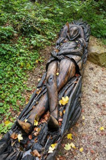 Wooden sculpture The Sleeping Count, Pfullinger Sagenweg, stories and legends, by woodsaw artist