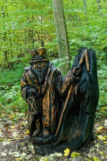 Wooden sculpture The Meerkat from Urschelberg, Pfullinger Sagenweg, stories and legends, by woodsaw