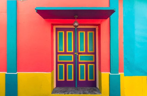 Colorful colonial architecture of historic center of Flores, Guatemala