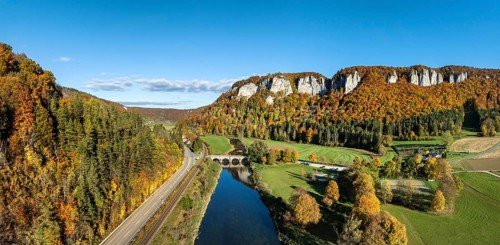 Aerial view, panorama of the Upper Danube Valley, surrounded by autumn vegetation with the