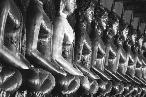 Gilded Buddha statues (Bhumispara mudra: Buddha Gautama at the moment of enlightenment), Wat Suthat