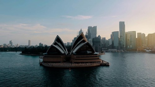 View of landmark performing arts center Opera House in Sydney harbor, Australia