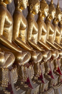Gilded Buddha statues (Bhumispara mudra: Buddha Gautama at the moment of enlightenment), Wat Suthat