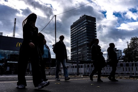 Passers-by in downtown Essen at the main train station, North Rhine-Westphalia, Germany