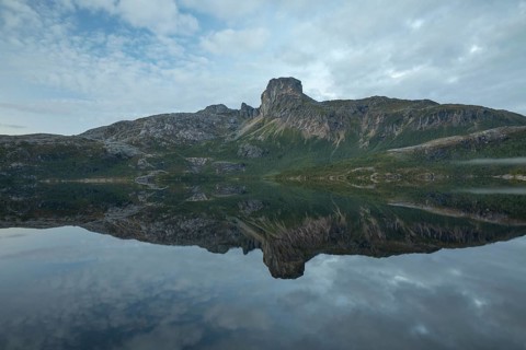 Reflection in Steigtindvatnet in front of the majestic Steigtinden in Norway near Bodø