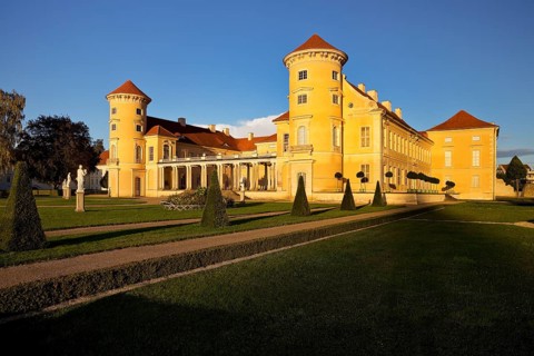 Rheinsberg Castle, front in late evening light, prime example of Friederician Rococo, Ruppiner